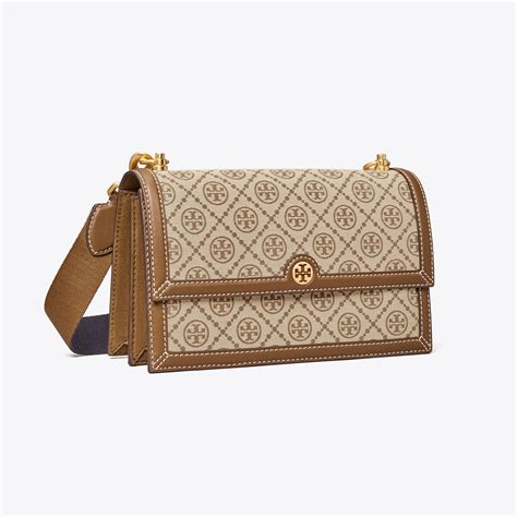 tory burch monogram shoulder bag.